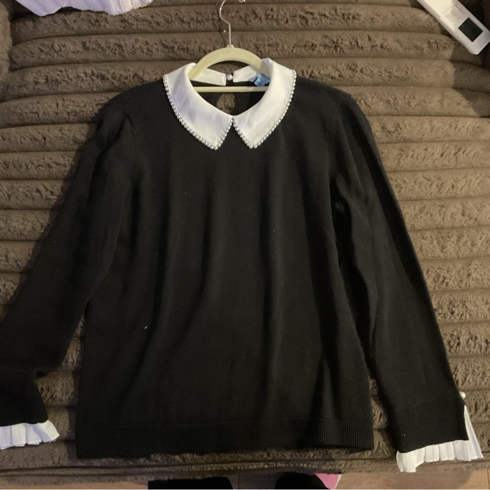 Elegant Black Sweater with White Accents